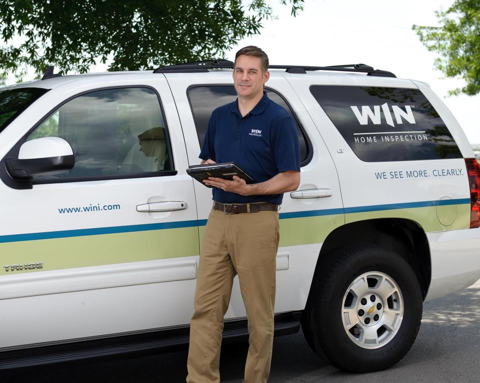 George Gaves in front of WIN van