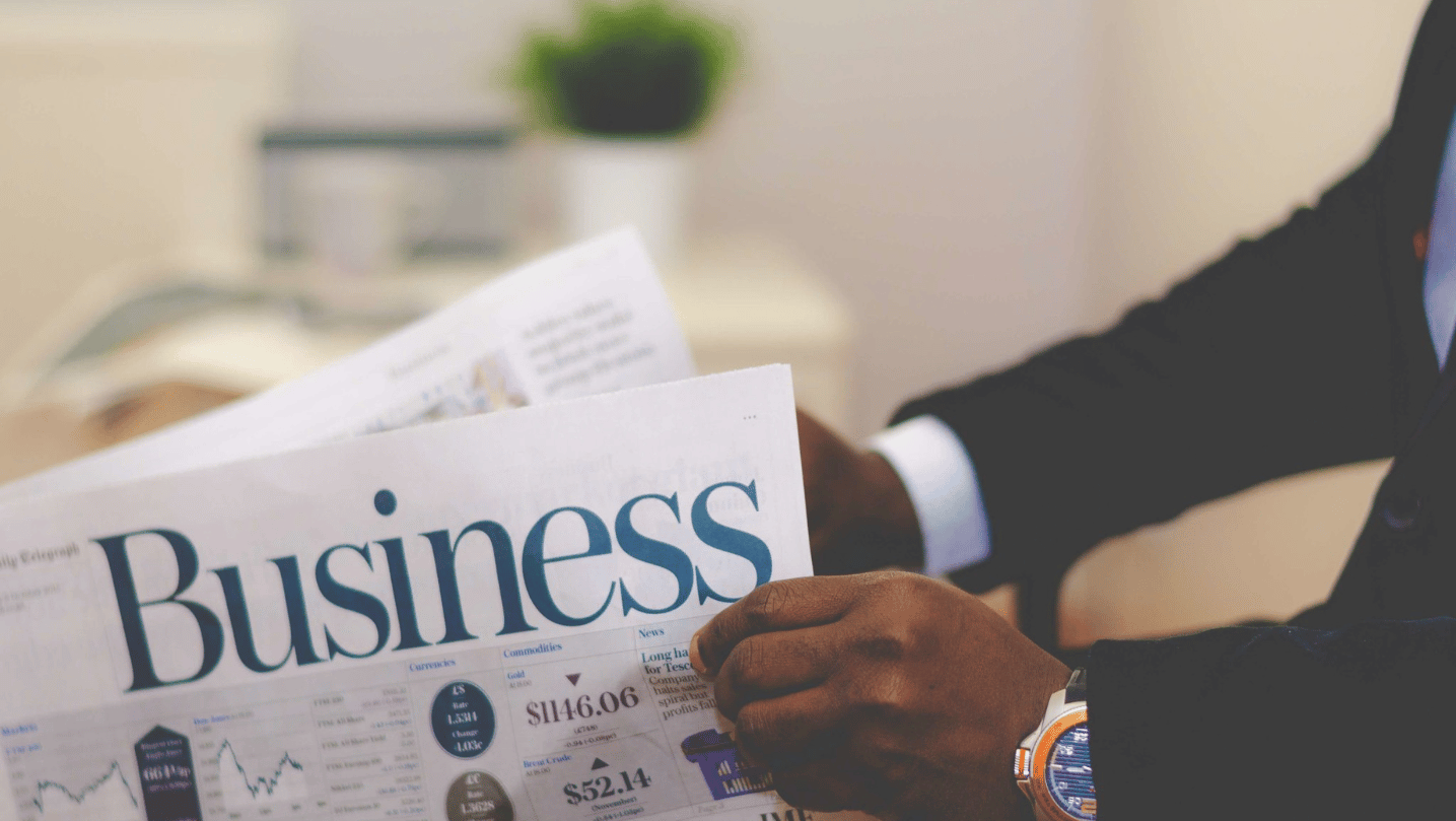 Person Holding White and Blue Business Paper